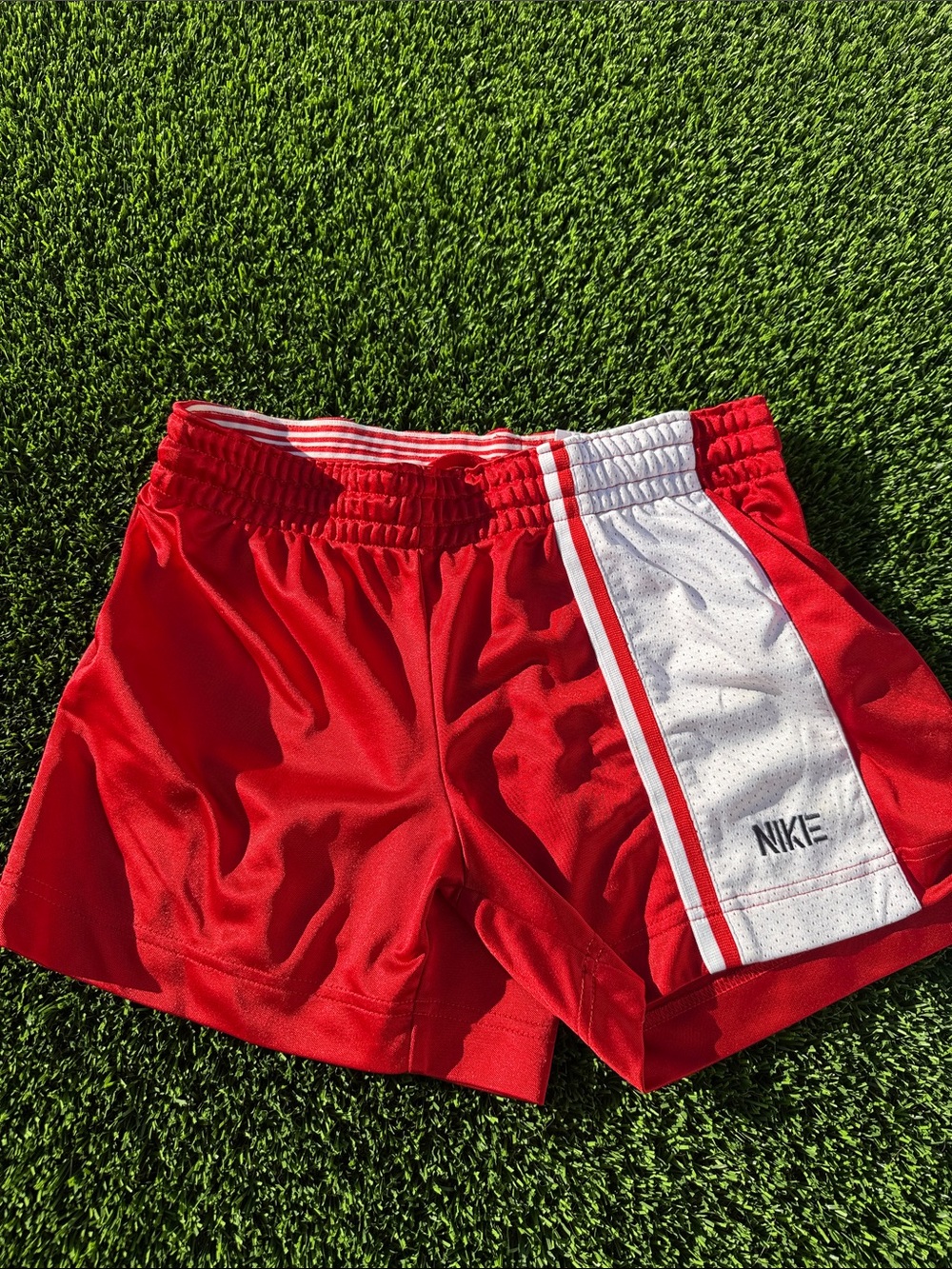 Nike Red Women's Athletic Shorts with White Side Stripe